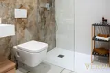 Bathroom with shower and wall-hung toilet — NOVA interior reference photograph
