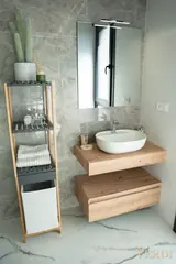 Bathroom vanity and mirror — NOVA interior reference photograph