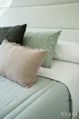 Bedroom cushions close-up — NOVA interior reference photograph