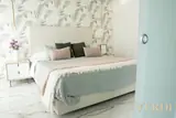 Bedroom with leaf-pattern wallpaper — NOVA interior reference photograph