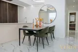 Dining table and round mirror — NOVA interior reference photograph