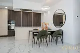 Kitchen cabinetry and dining table — NOVA interior reference photograph