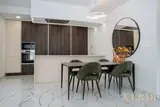 Kitchen and dining area overview — NOVA interior reference photograph