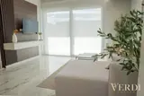 Living room towards the large window — NOVA interior reference photograph