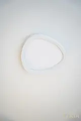 Rounded white light fitting — NOVA interior reference photograph