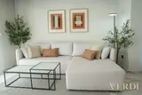 Sofa viewed across the coffee tables — NOVA interior reference photograph