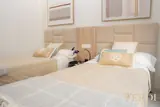 Twin beds and upholstered headboards — NOVA interior reference photograph