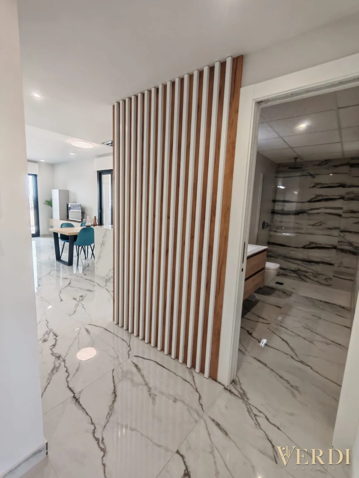 Interior reference: entrance and slatted partition