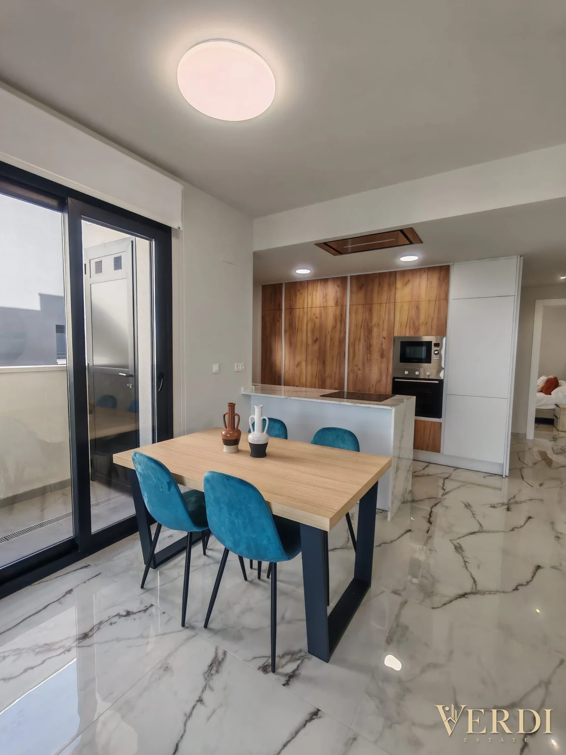 Interior reference: dining table and kitchen